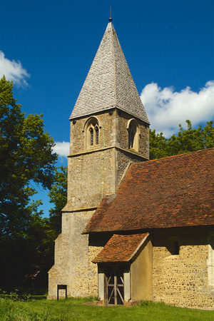 The 14th Century west tower and south porch